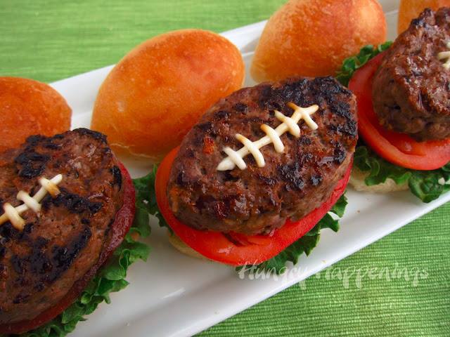 Football burgers with lettuce and tomato